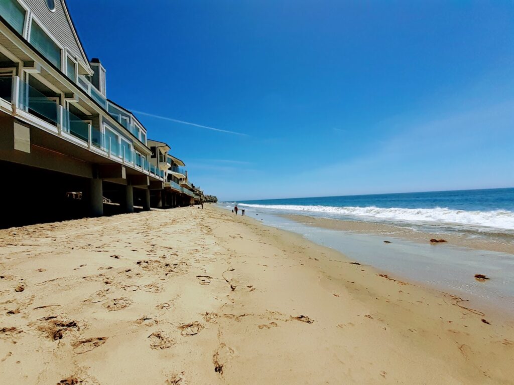 Scenic coastline and sandy shore at Escondido Beach in Malibu, California.