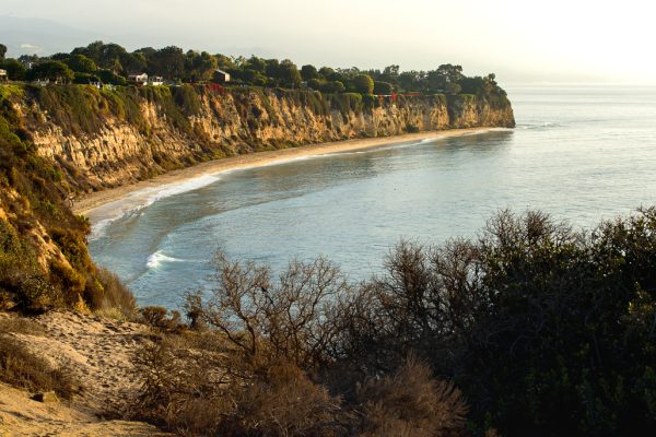 Coastal cliffs overlooking the ocean at Point Dume State Beach in Malibu, California.